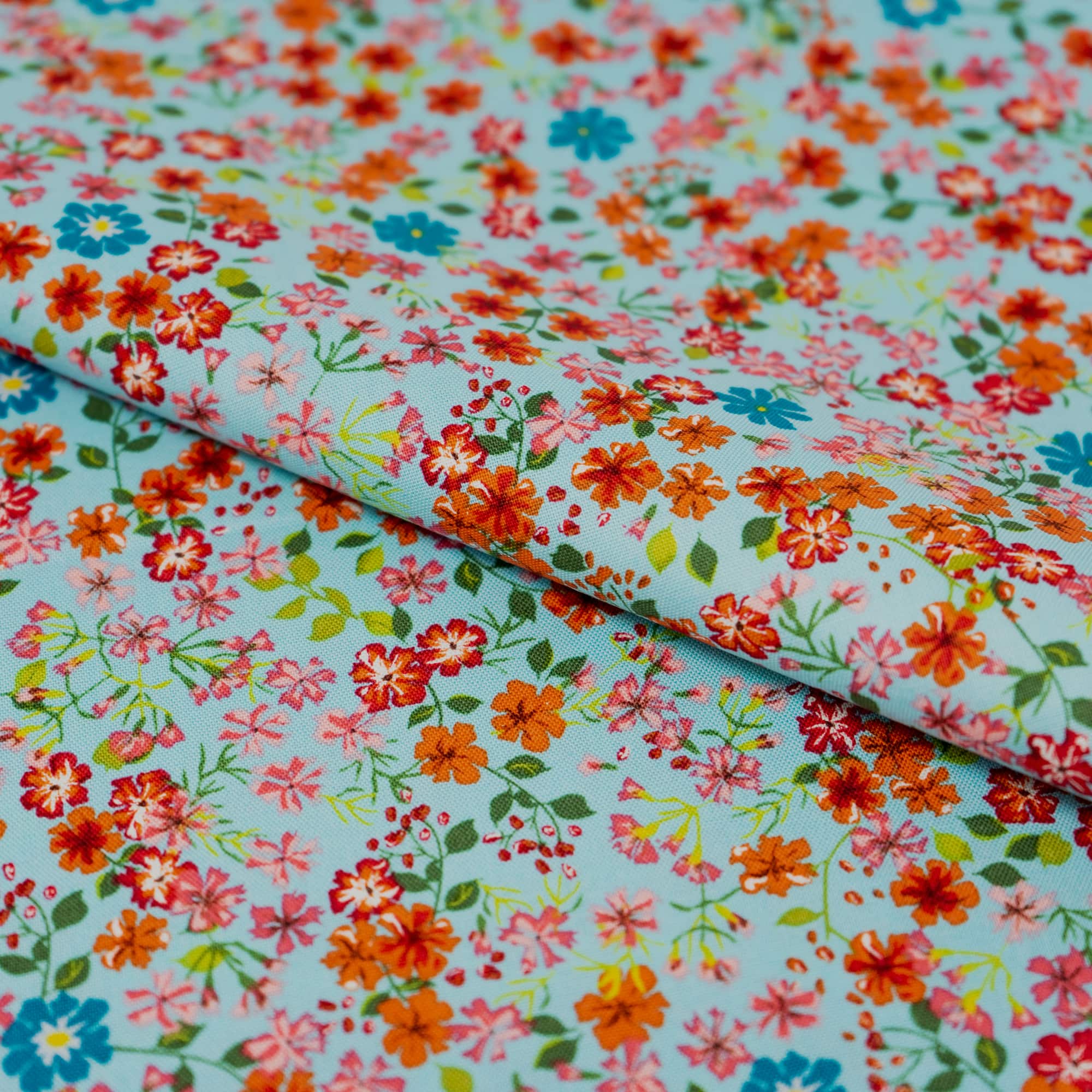 SINGER Orange Small Floral on Blue Cotton Fabric